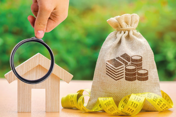Model house bag with money and tape measure - Benefits of Soft Money Loans for Investment Properties - DG Pinnacle Commercial - Miami Mortgage Lender
