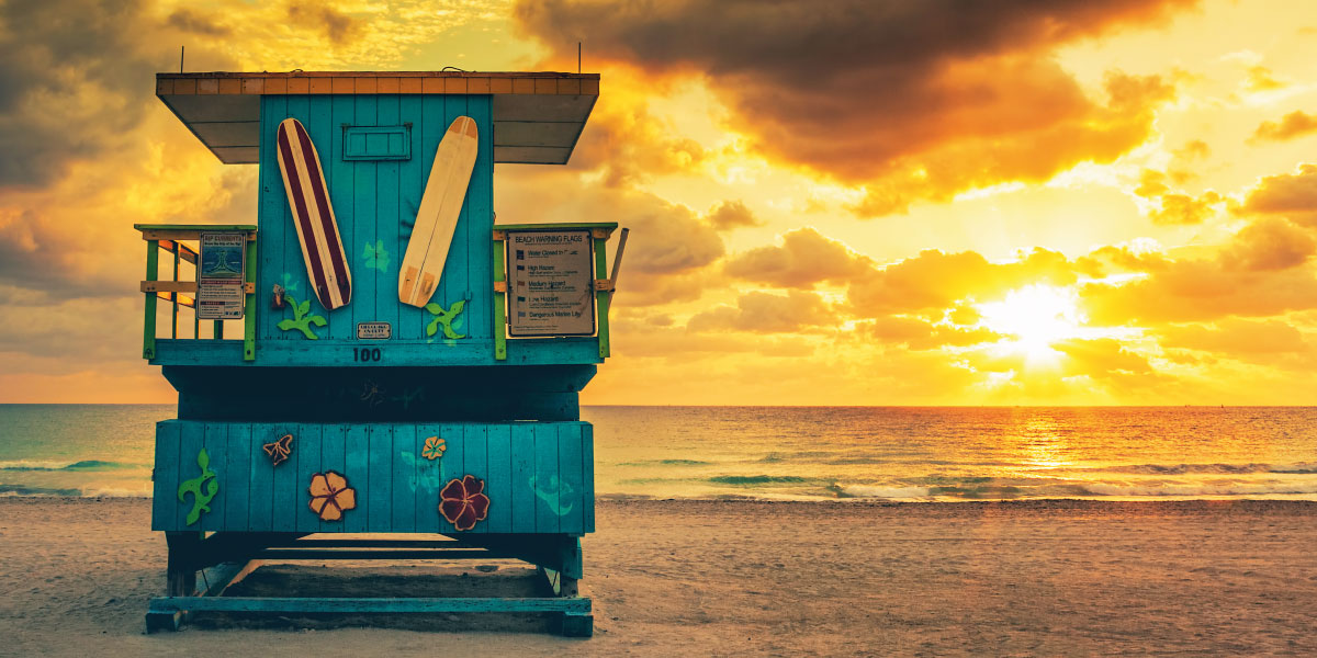 Miami South Beach sunrise with lifeguard tower - Miami, Tampa Top Home Price Hikes - DG Pinnacle Commercial - Miami Mortgage Lender